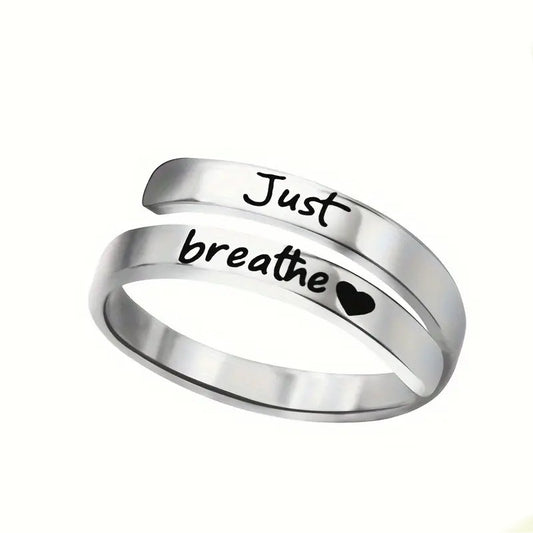 Anillo de corazón en espiral plateado